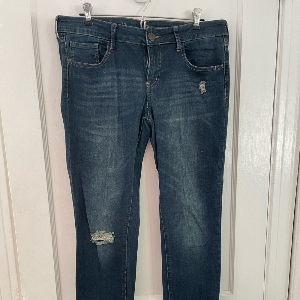 Authentic American Heritage skinny blue jeans.